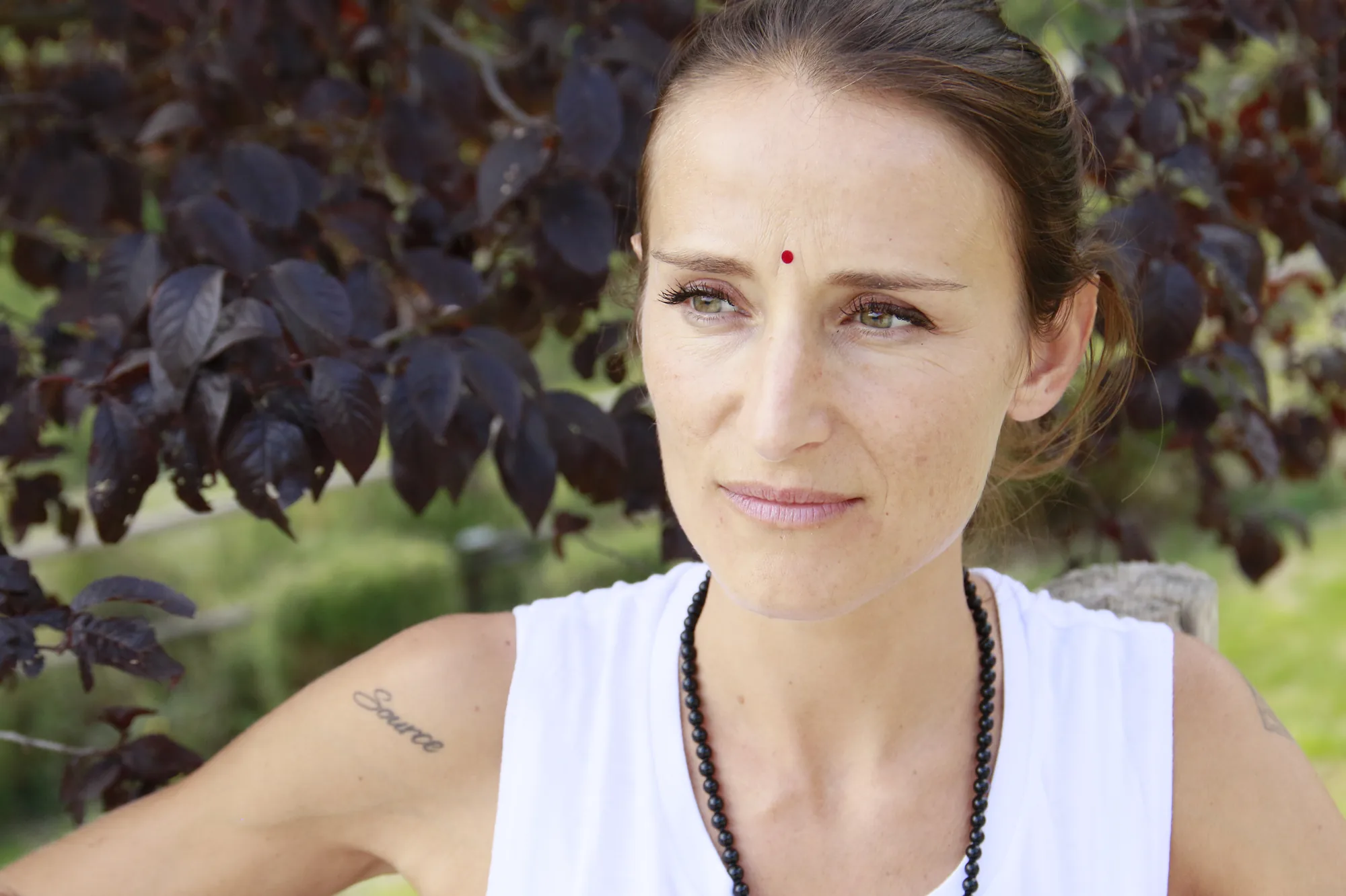 Giada Col, founder of GIVER®, Kundalini Activation Astral Work teacher, photographed outdoors in Italy