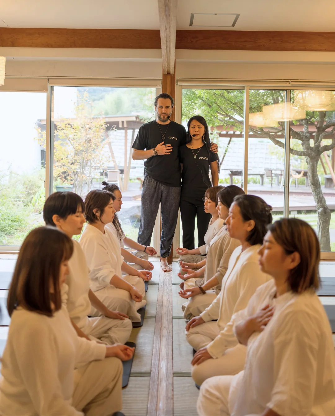 Trainee facilitators working with healing energy during the GIVER® training in Japan